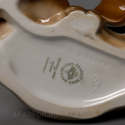 Фарфоровая статуэтка "Щенок таксы лежит" Rosenthal Германия (фото №33065)